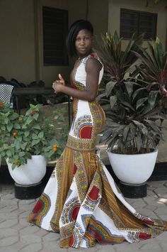 This stunning dress is the work of our hands uniquely designed with an African print dashiki motif . Patterns are professionally arranged to bring beauty to the dress. This dress is made to suit all occasions including church service, prom, graduation, wedding, engagement etc.... This dress is crafted by me and the model is Elizabeth our customer service head and designer. You can get more detail on this dress by watching the video we have posted on the about section of our shop. Since it is our Dashiki Prom Dress, Dresses By Occasions, Prom Dress African, Dashiki Skirt, African Prom Dress, Africa Clothes, Kitenge Designs, African Party Dresses, African Wedding Attire