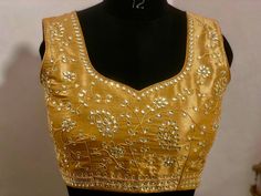 Hand made Exclusive bridal collection  Work kardana n zardosi Net hands Stone studded great work  hand work completely , awesome skills applied work ! Any color can be done ! Gold Silver come up with any color with your blouse measurements we can make it for you! contact seller for time and dispatch Navratri Embellished Chanderi Blouse Piece, Embellished Chanderi Blouse With Traditional Drape, Gold Embellished Blouse Piece For Designer Wear, Embellished Semi-stitched Tops For Diwali, Bollywood Style Embellished Chanderi Blouse, Traditional Embellished Yellow Saree, Traditional Yellow Embellished Saree, Gold Embellished Semi-stitched Blouse Piece, Festive Embellished Chanderi Blouse