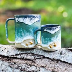 Bring the beauty of the ocean shoreline into your home! Awaken your senses as you feel the 3D starfish in the gritty-textured sand and the raised, smooth texture of the sea foam. Enjoy moving your fingers along the side of the mug while drinking your favorite beverage! This mug is handmade and hand painted to remind you of waves rolling in to your favorite beach.  Due to the handmade nature of this product, each one is one-of-a-kind and varies slightly in size and shape. Each of my mugs is a pie Ocean Glaze Ceramics, Ocean Pottery, Beach Mugs, Ocean Mug, Functional Artwork, Surf Jewelry, Ceramic Glaze Recipes, Pottery Form, Cat Drinking