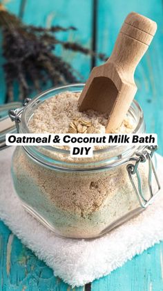 oatmeal and coconut milk bath in a glass jar with a wooden spoon