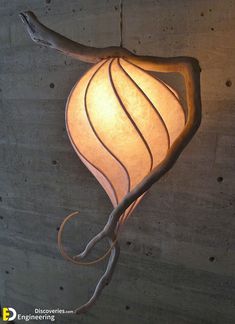 a lamp hanging from the side of a wall