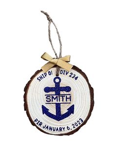 a wooden ornament with an anchor and the words ship of div 223