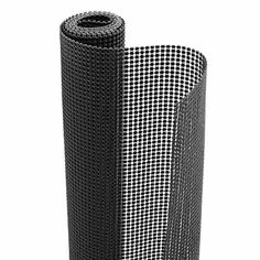 a roll of black and white checkered fabric next to each other on a white background