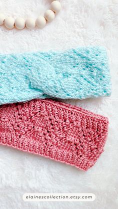 two crocheted headbands laying next to each other