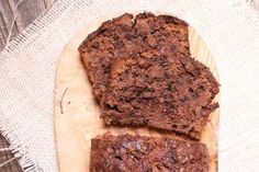 two slices of chocolate bread on a cutting board