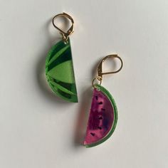 Slice into summer with these watermelon statement earrings! Studs or 14k gold filled huggie – choose your own adventure. Lookin' gorg at 2" – one earring represents a succulent slice, the other the melon's gorgeous exterior. Every piece of jewelry is hand formed and hand assembled by me. Due the unique nature of the product you may not get the pictured earrings. Watermelon Accessories, Watermelon Jewelry, Choose Your Own Adventure, Black Glaze, Black Stud, Earthenware Clay, Unique Nature, Steel Post, Earrings Studs