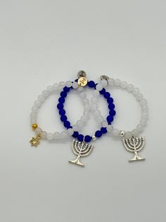 Blue beads with silver accent beads with a silver menorah charm bracelet. Adorable by itself or stacked with a few other holiday bracelets! $18 By Little Miss Zoe Holiday Bracelets, Holiday Beading, Event Sign, Yellow Brick Road, Children's Boutique, Boys Accessories, Menorah, Star Of David, Silver Accents