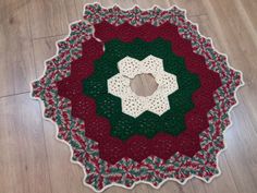 a crocheted doily is laying on the floor