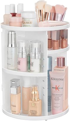 PRICES MAY VARY. LARGE CAPACITY - The HBlife 360 rotating organizers and storage can hold at least 30 makeup brushes, 20 skincare products, hair accessories, and other beauty and bathroom supplies. The 360-rotating designs allow you to grab what you need quickly. PERFECT DESIGN - HBlife adjustable cosmetic display case maximizes your storage needs. The trays can design at a height to fit various sizes of cosmetics and accessories. It will approve by your vanity and bathroom. DIY your charming sp Makeup Organizer Countertop, Spinning Organizer, Rotating Makeup Organizer, Penyimpanan Makeup, Perfume Organizer, Perfume Organization, Care Organization, Cosmetic Display, Make Up Organiser