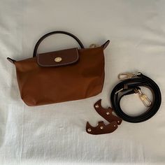 Reposhing This Item I Purchased From @Handsomeluciana. Loved It, But Ready To Rotate For Something New. Questions? Leave A Comment Below! Longchamp Mini Bag, Longchamp Mini, Longchamp Handbags, Dumpling Bag, Longchamp Bags, Brown Trim, Dumplings, Things To Buy, Womens Tote Bags