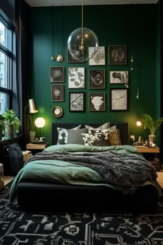 a bedroom with green walls and pictures on the wall above the bed, along with a black rug