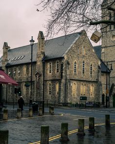 an old stone church with a clock tower