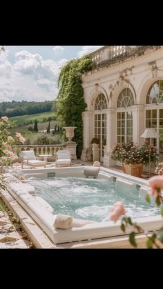 an outdoor jacuzzi in the middle of a garden