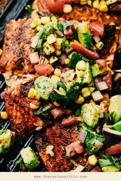 grilled fish with corn, avocado and tomato salsa on the bbq