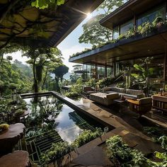 an outdoor swimming pool surrounded by greenery