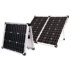 two small solar panels sitting next to each other on top of a white board holder