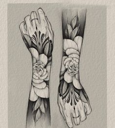 two hands with flowers and leaves on them