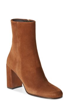 This Italian-made suede bootie is perched on a logo-gilded demi-block heel that brings a modern feel to the classic style. 3 1/4" (85mm) heel Side zip closure Leather upper and lining/rubber and leather sole Made in Italy Designer Shoes Nordstrom Store, Anniversary Sale, Suede Booties, Bootie, Side Zip, Designer Shoes, Block Heels, Classic Style, Prada