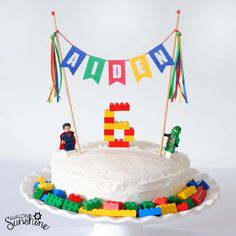 a birthday cake with legos on it