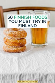 three donuts and a glass of beer on a table with the words 30 finnish foods you must try in finland