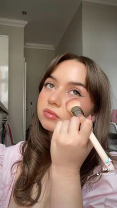 a girl applys rare beauty’s soft liquid pinch blush in shade ‘encourage’ - it is a neutral pink blush with a dewy finish Encourage Blush Rare Beauty, How To Use Rare Beauty Blush, Rare Blush, Neutral Pink, Face Makeup Tutorial, Pink Shade