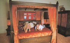 two women laying on a bed in a bedroom