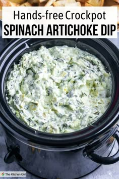 Spinach artichoke dip in a black slow cooker. Title? Hands-free Crockpot Spinach Artichoke Dip Easy Crockpot Spinach Artichoke Dip, Crockpot Spinach Artichoke Dip, Slow Cooker Spinach Artichoke Dip, Crockpot Spinach, Dip Recipes Crockpot, Best Spinach Artichoke Dip, Dip Recipes Hot, Small Slow Cooker, Spinach Artichoke Dip Recipe