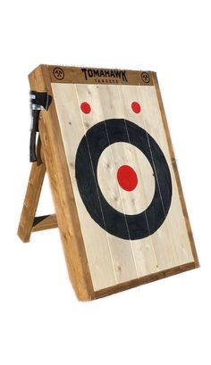 a wooden board with an arrow and target on the side, in front of a white background