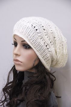 "100% Wool hand knitted hat. This ivory hat features on an interesting shape with irregular patterns and rolled edges. It suits ant outfits style. Color:Ivory Length:11 1/2\" from top to bottom Measurements: 18\" (relaxed) 26\" (stretched) - it can fit any size! Hand wash in cold water with detergent or shampoo and lay flat until dry." Warm White Bonnet For Fall, White Warm Casual Bonnet, Casual Warm White Bonnet, Casual White Knitted Bonnet, Casual White Bonnet One Size, Casual White One-size Bonnet, Casual White Brimmed Beanie, Casual White Crochet Hat For Winter, White Warm Bonnet One Size