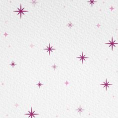 pink stars on white background with space for text