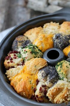 a pan filled with different types of pastries