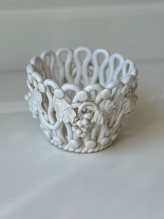 a white bowl sitting on top of a table