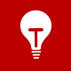 a light bulb with the letter t in it's center on a red background