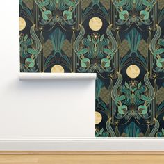 the wall paper is designed to look like an art deco design with green and gold colors