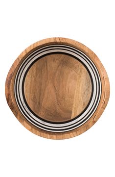 an oval wooden tray with black and white stripes