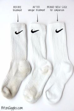 three pairs of white socks with black nike logo on them