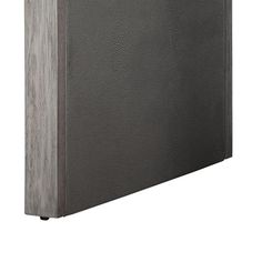 the back side of a gray leather book case