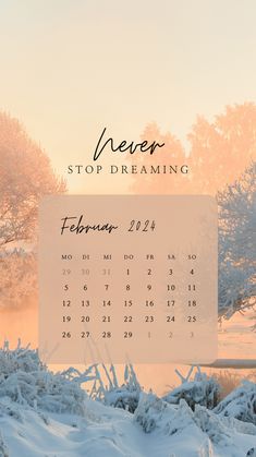 a calendar sitting on top of a pile of snow in the middle of wintertime