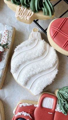 decorated cookies are sitting on a table