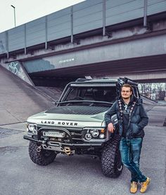 a man standing in front of a truck