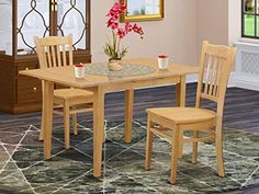 a wooden table with two chairs and a potted plant on top of the table