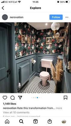 the bathroom is decorated with floral wallpaper and black and white floor tiles, along with a toilet