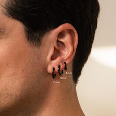 M E N ' S ∙ B L A C K ∙ H O O P S Edgy yet minimalist, our sleek Black Hoops will elevate any outfit. Whether dressed up for a special occasion or sporting a casual everyday look, these versatile earrings are a must-have in his collection. Grab all three sizes to create a set and you have the perfect gift for him! * Material: Stainless Steel ∙ Hypoallergenic ∙ Waterproof ∙ Tarnish Free * Finish: Black IP * Inner Hoop Dimensions: Small - 6mm, Med - 9mm, Large - 11mm * Sold as Pairs O T H E R ∙ I Black Hoop Earrings Men, Hoop Earrings Men, Boyfriend Gift Birthday, Black Drop Earrings, Sideways Initial Necklace, Black Hoops Earrings, Dainty Initial Necklace, Mens Earrings Hoop, Diamond Huggies