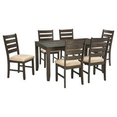 a dining room table with six chairs and one chair upholstered to the side