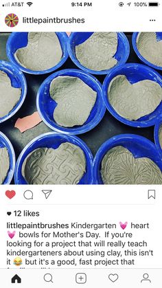 several blue bowls filled with cement next to each other