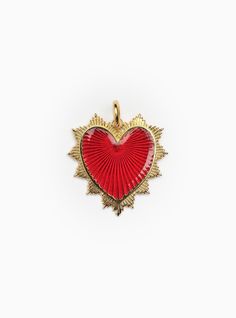 Unapologetically vibrant, backed in red enamel or radiating beams of pure gold, this charm dares you to wear your heart on your sleeve and love boldly, without hesitation. Materials & Dimensions 14k plated gold over brass; red enamel option 1.25" wide; 1.5" long Religious Photography, Heart On Your Sleeve, Religious Tattoo, Heart Red, Modern Muse, Symbolic Jewelry, Royal Jewelry, Religious Jewelry, Purse Charms