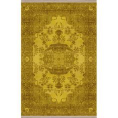 a yellow rug with an ornate design on the front and back side, in different colors