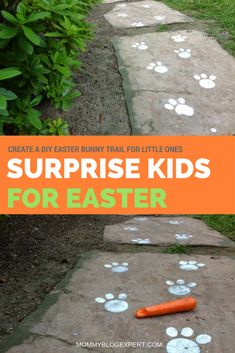 an orange carrot laying on the ground next to a sidewalk with white footprints and words that read, surprise kids for easter