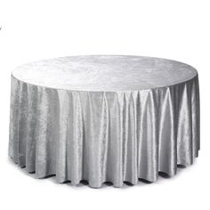 an image of a round table with silver cloth on it's top and bottom