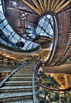 an escalator in the middle of a building